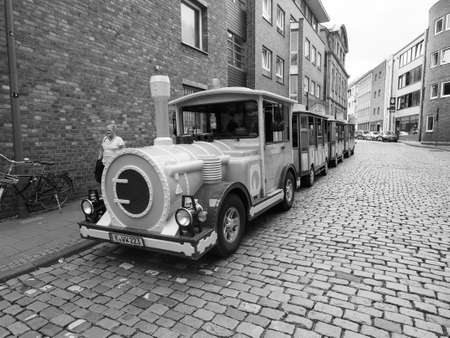 KOELN, GERMANY - CIRCA AUGUST 2019: touristic sightseeing train in black and whiteのeditorial素材