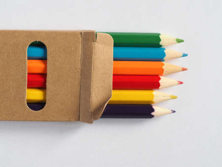 colour pencil crayons in a cardboard boxの写真素材