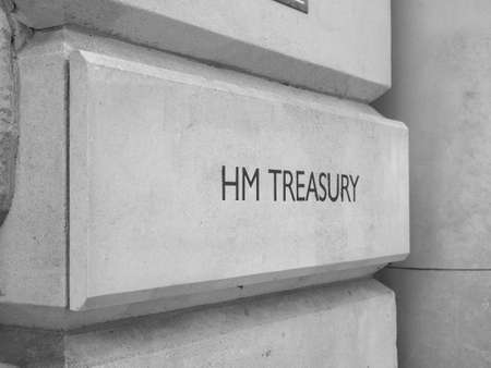 HMRC (Her Majesty Treasury) sign in London, UK in black and whiteの写真素材