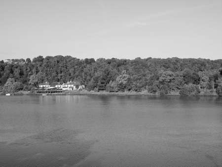 River Wye (Afon Gwy in Welsh) marks the border between England and Wales in Chepstow, UK in black...