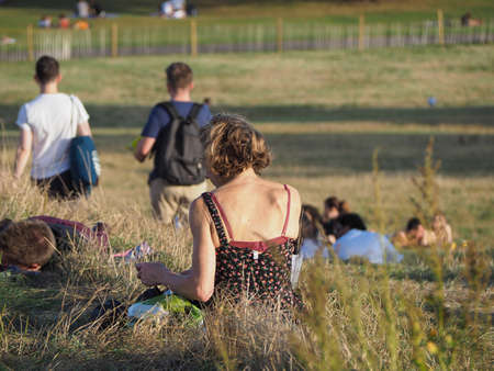 LONDON, UK - CIRCA SEPTEMBER 2019: People on Primrose Hill north of Regent's Park