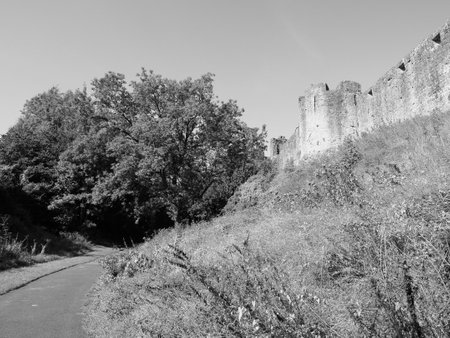 Ruins of Chepstow Castle (Castell Cas-gwent in Welsh) in Chepstow, UK in black and whiteのeditorial素材