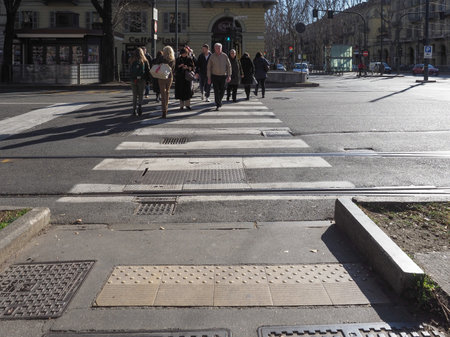 TURIN, ITALY - CIRCA FEBRUARY 2020: People walking in the city centreのeditorial素材
