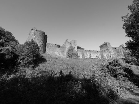 Ruins of Chepstow Castle (Castell Cas-gwent in Welsh) in Chepstow, UK in black and whiteのeditorial素材
