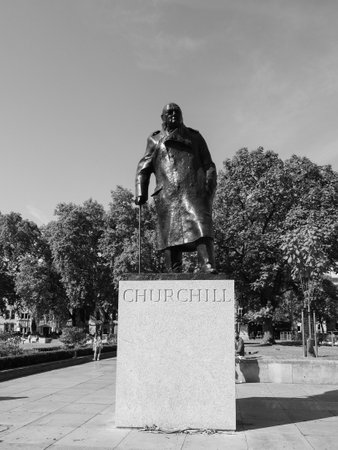 LONDON, UK - CIRCA SEPTEMBER 2019: Winston Churchill statue in Parliament Square by sculptor Ivor Roberts-Jones in black and whiteのeditorial素材