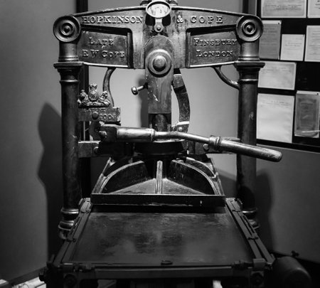 CHEPSTOW, UK - CIRCA SEPTEMBER 2019: Vintage printing press at Chepstow Museum in black and whiteのeditorial素材