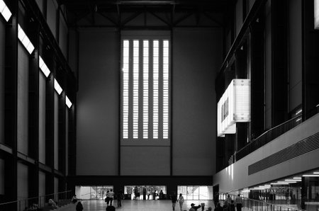 LONDON, UK - CIRCA SEPTEMBER 2019: Tate Modern art gallery in South Bank power station in black and whiteのeditorial素材