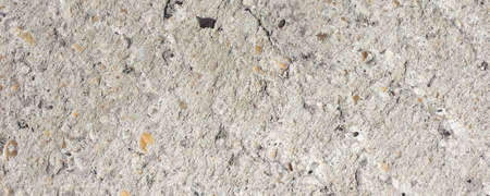 wide grey concrete wall useful as a background