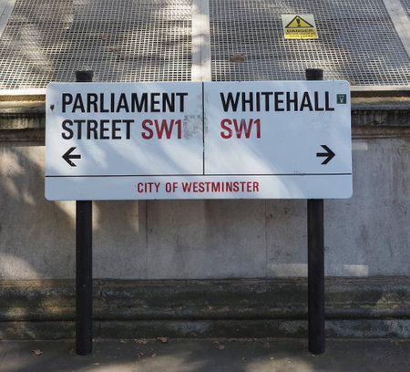 LONDON, UK - CIRCA SEPTEMBER 2019: Parliament street and Whitehall SW1 sign in the City of Westminsterのeditorial素材
