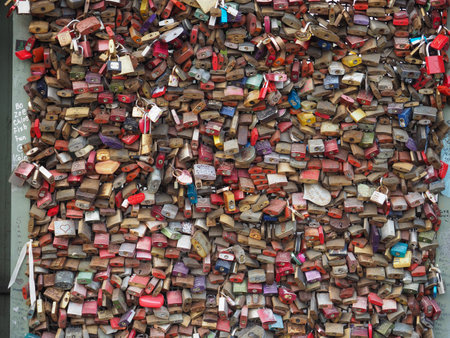 KOELN, GERMANY - CIRCA AUGUST 2019: Lovelocks on Hohenzollernbruecke (meaning Hohenzollern Bridge) crossing the river Rheinのeditorial素材