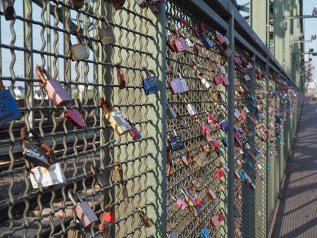 KOELN, GERMANY - CIRCA AUGUST 2019: Lovelocks on Hohenzollernbruecke (meaning Hohenzollern Bridge) crossing the river Rheinのeditorial素材