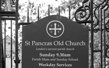 LONDON, UK - CIRCA SEPTEMBER 2019: St Pancras Old Church sign in black and white