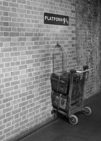 LONDON, UK - CIRCA SEPTEMBER 2019: Harry Potter Platform Nine and Three Quarters at King's Cross Station in black and whiteのeditorial素材