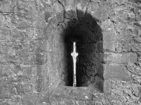 CHEPSTOW, UK - CIRCA SEPTEMBER 2019: Ruins of Chepstow Castle (Castell Cas-gwent in Welsh) in black and whiteのeditorial素材