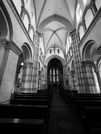 KOELN, GERMANY - CIRCA AUGUST 2019: St Andreas romanesque basilica in black and whiteのeditorial素材