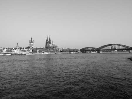 KOELN, GERMANY - CIRCA AUGUST 2019: View of the city skyline from the river in black and whiteのeditorial素材