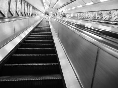 LONDON, UK - CIRCA SEPTEMBER 2019: escalators in London underground station in black and whiteのeditorial素材