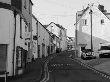 CHEPSTOW, UK - CIRCA SEPTEMBER 2019: Bridge Street colourful houses in black and whiteのeditorial素材