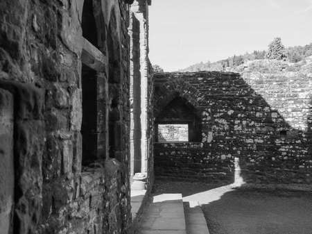 TINTERN, UK - CIRCA SEPTEMBER 2019: Tintern Abbey (Abaty Tyndyrn in Welsh) ruins in black and white