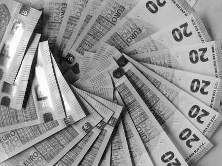 Euro banknotes and coins (EUR), currency of European Union in black and whiteの写真素材