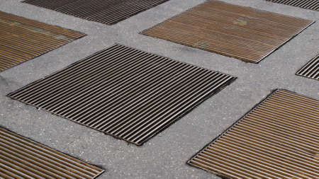 manhole cover grid useful as an industrial background
