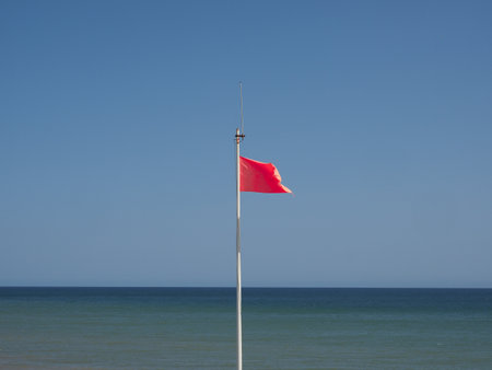 red flag meaning high hazard at the sea