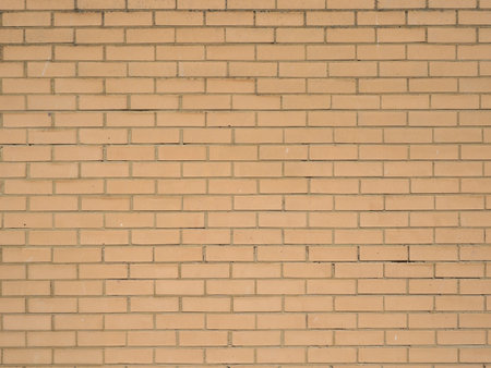 yellow brick wall useful as a backgroundの写真素材