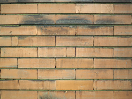 yellow brick wall useful as a backgroundの写真素材