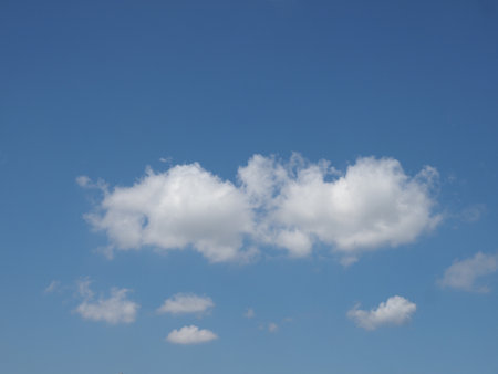 blue sky with clouds useful as a backgroundの写真素材