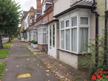 A row of typically British terraced houses aka townhouses in Tanworth in Arden, UKの写真素材