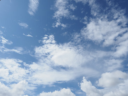 blue sky with clouds useful as a backgroundの写真素材