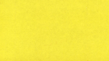 yellow corrugated cardboard texture useful as a backgroundの写真素材