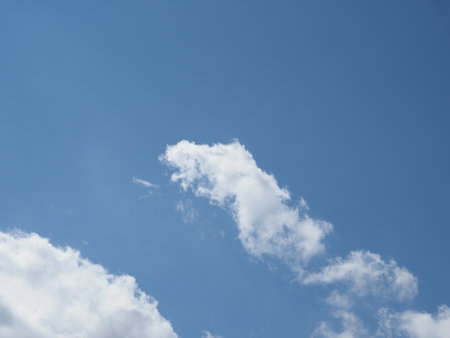 blue sky with clouds useful as a backgroundの写真素材