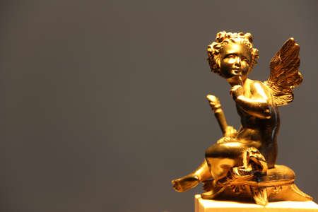 Winged putto asking for silenceの写真素材