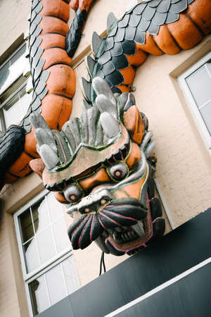LONDON, ENGLAND October 2, 2013: sign "dragon" of a shop at Camden Town, London.のeditorial素材