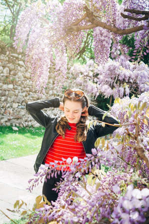 Teen girl in the gardenの写真素材