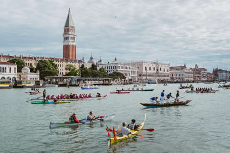 Venice, Italy - May 24, 2015: People at forty-first Vogalonga of Venice. The Vogalonga is a rowing regatta of boats "non-competitive" held in Venice in May.のeditorial素材