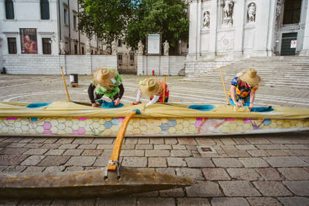 Venice, Italy - May 24, 2015: People at forty-first Vogalonga of Venice. The Vogalonga is a rowing regatta of boats "non-competitive" held in Venice in May.のeditorial素材