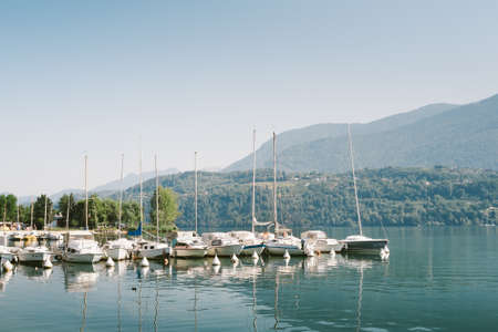 Levico, Italy - August 6, 2015: Boats moored on Lake Levico, Trento.のeditorial素材