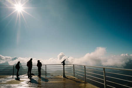 Silhouette of people on the terrace of the top Lagazuoi, Dolomites Italyの写真素材