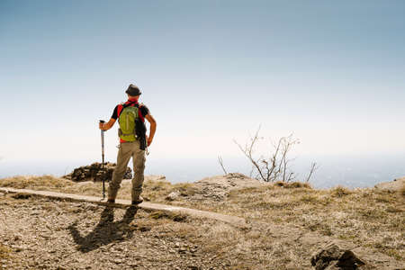 mountaineer who watches the scene