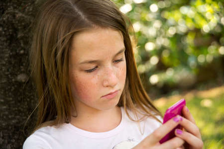 little girl with mobile phone
