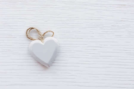 Decoration in heart shape on wooden planks. Valentine's Day postcardの写真素材