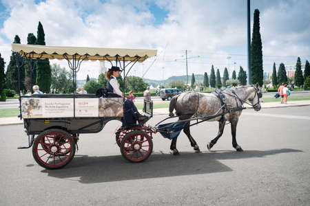 Lisbon, Portugal - May 9, 2017: Carriage for transport of tourists from the Portuguese school of...