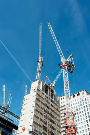 London, United Kingdom - May 24, 2017 : Cranes and construction site construction skyscrapersのeditorial素材