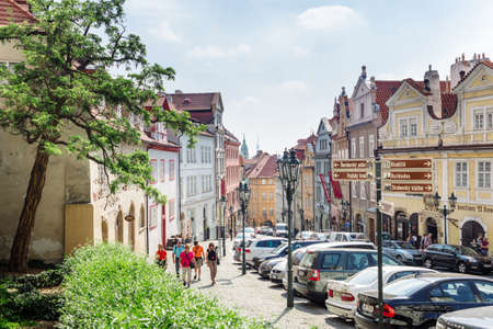 Prague, Czech Republic - May 23, 2018: Nerudova Street in the district of Mala Strana. Parked cars...