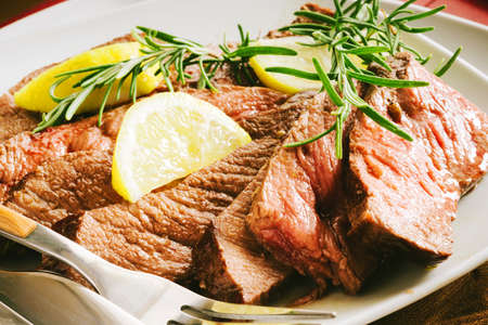 Barbecue Wagyu T-Bone Steak sliced on Cutting Boardの写真素材