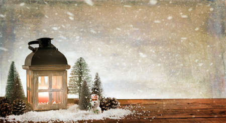 Lantern with Christmas trees, snowman and Christmas decorations. Christmas card.の写真素材