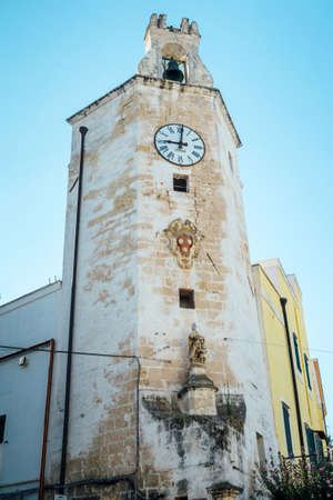 Monopoli, Puglia Italy - Thursday 22 August 2019: tower with clockのeditorial素材