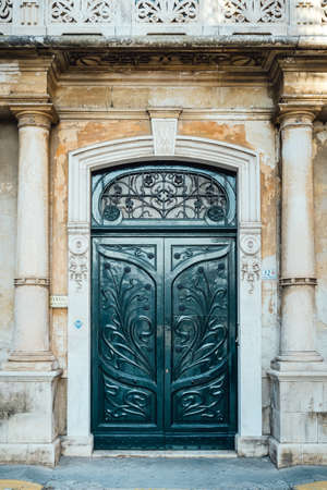 Monopoli, Puglia Italy - 22 August 2019: door decorated in Liberty style